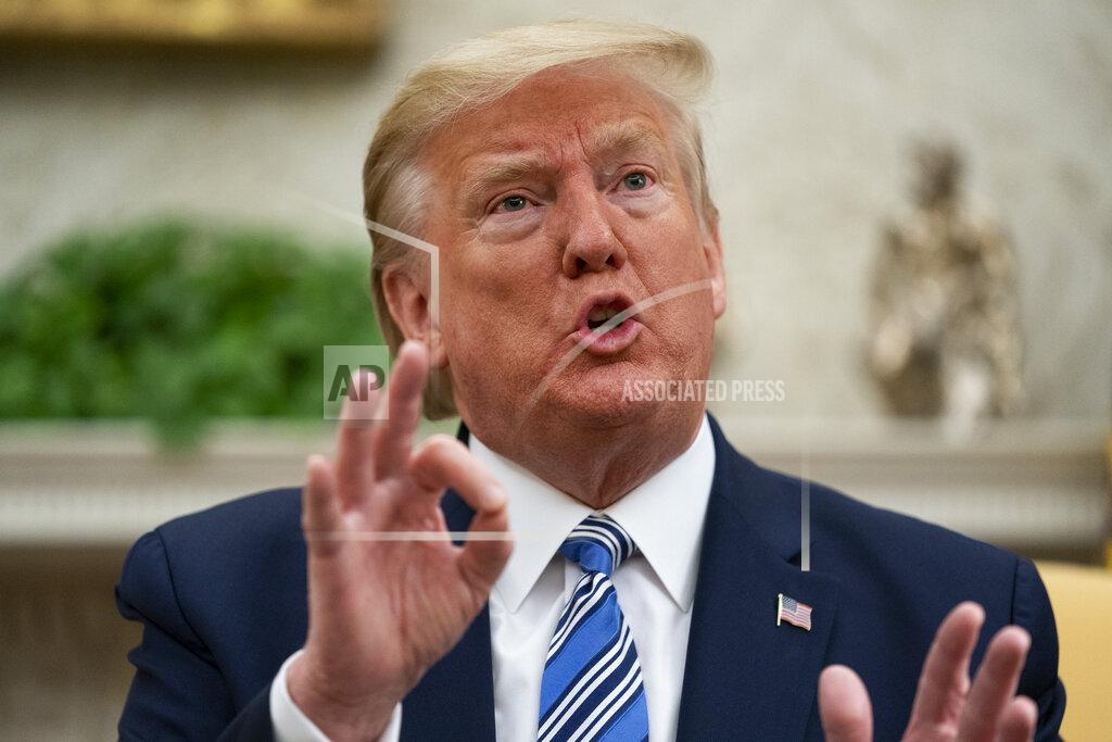 Evan Vucci President Donald Trump speaks during a meeting with Gov. Ron DeSantis, R-Fla., on the coronavirus response, in the Oval Office of the White House, Tuesday, April 28, 2020, in Washington. (AP Photo/Evan Vucci)