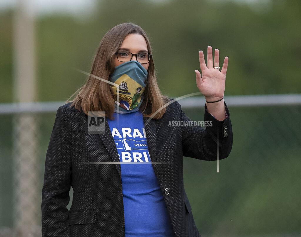 Jason Minto FILE - In this Tuesday, Sept. 15, 2020 file photo, transgender activist Sarah McBride, who hopes to win a seat in the Delaware Senate, campaigns at the Claymont Boys & Girls Club in Claymont, Del. McBride, who has long-standing ties to Delaware’s best-known political family, says, “I am very aware of the stark contrast between the president we could have (Biden) and the president we now have. ... There has never been a moment in the fight for trans equality with such potential and at the same time such risk.” (AP Photo/Jason Minto)