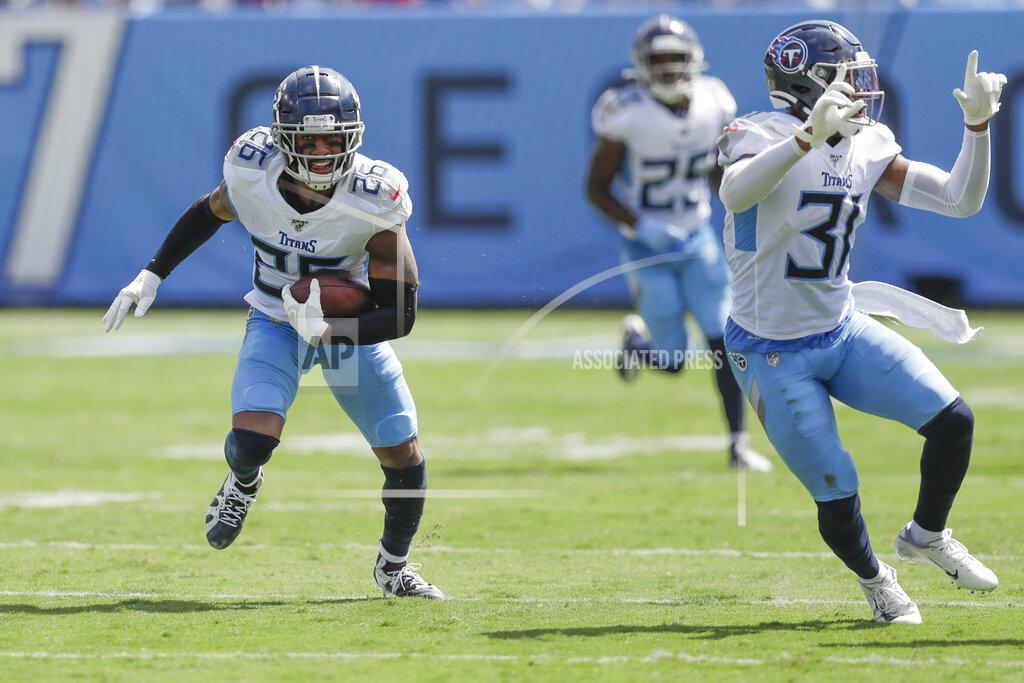 James Kenney Tennessee Titans cornerback Logan Ryan (26) runs the ball back after he intercepted a pass against the Indianapolis Colts in the first half of an NFL football game Sunday, Sept. 15, 2019, in Nashville, Tenn. Ryan was ruled down where the interception was made. (AP Photo/James Kenney)