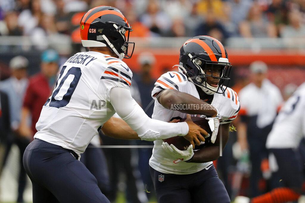 Jeff Roberson Chicago Bears quarterback Mitchell Trubisky, left, hands off to running back Tarik Cohen during the half of an NFL football game against the Minnesota Vikings Sunday, Sept. 29, 2019, in Chicago. (AP Photo/Jeff Roberson)