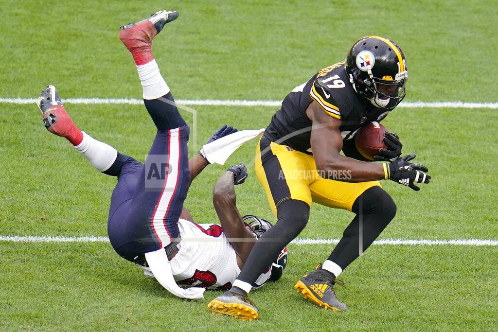 Gene J. Puskar Pittsburgh Steelers wide receiver JuJu Smith-Schuster (19) catches a two point conversion pass from quarterback Ben Roethlisberger with Houston Texans free safety Eric Murray (23) defending during the second half of an NFL football game in Pittsburgh, Sunday, Sept. 27, 2020. The Steelers won 28-21. (AP Photo/Gene J. Puskar)
