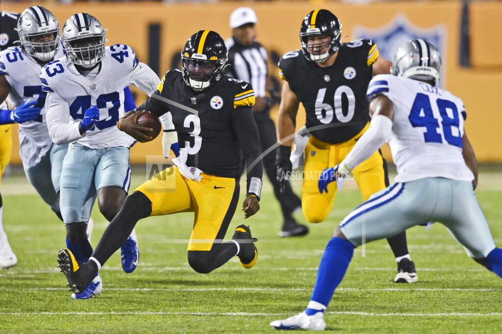 David Richard Pittsburgh Steelers quarterback Dwayne Haskins (3) rushes against the Dallas Cowboys during the first half of the Pro Football Hall of Fame NFL preseason game Thursday, Aug. 5, 2021, in Canton, Ohio. (AP Photo/David Richard)