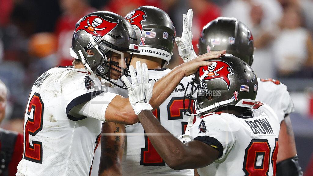 Scott Audette Tampa Bay Buccaneers quarterback Tom Brady (12) celebrates with wide receiver Antonio Brown (81) after a catch against the Dallas Cowboys during the second half of an NFL football game Thursday, Sept. 9, 2021, in Tampa, Fla. (AP Photo/Scott Audette)