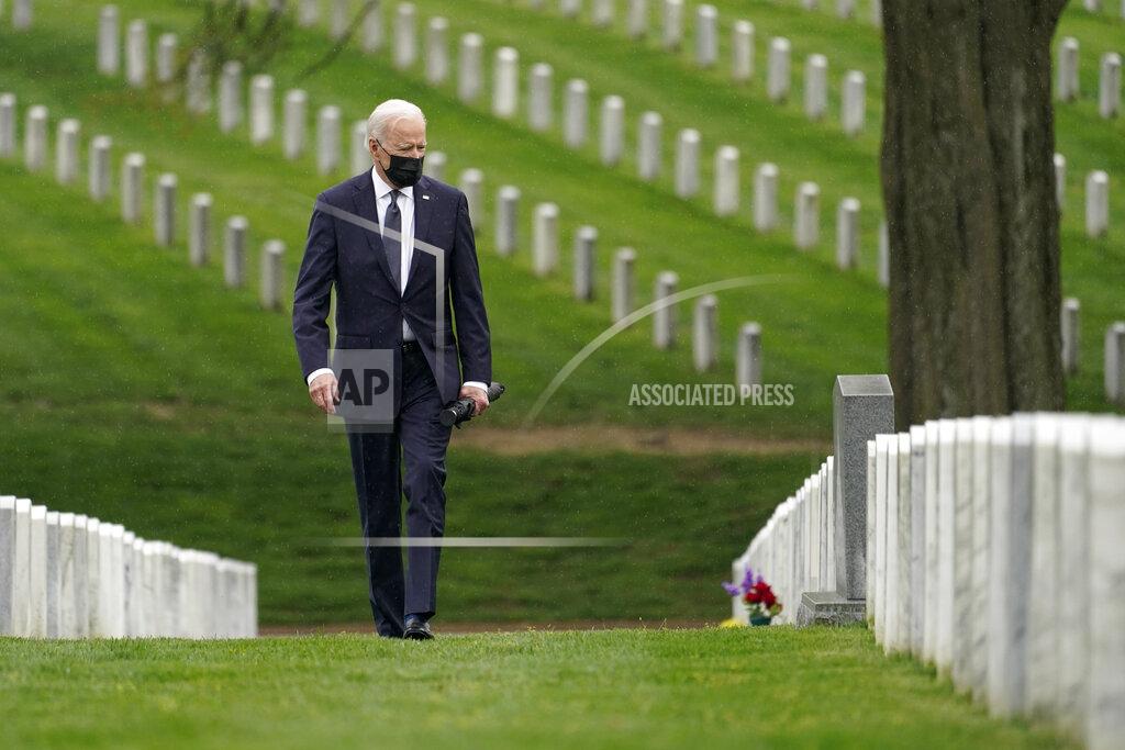 Andrew Harnik President Joe Biden visits Section 60 of Arlington National Cemetery in Arlington, Va., on Wednesday, April 14, 2021. Biden announced the withdrawal of the remainder of U.S. troops from Afghanistan by Sept. 11, 2021, the 20th anniversary of the terrorist attacks on America. (AP Photo/Andrew Harnik)
