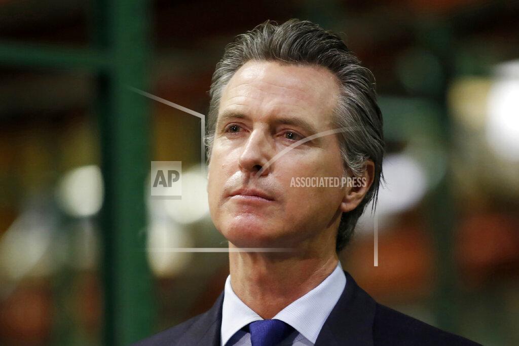 Rich Pedroncelli FILE - In this June 26, 2020, file photo, California Gov. Gavin Newsom listens to a reporter's question during a news conference in Rancho Cordova, Calif. Gov. Newsom is facing a possible recall election as the nation's most populous state struggles to emerge from the coronavirus crisis. Organizers say they have collected more than half of the nearly 1.5 million petition signatures needed to place the recall on the ballot. (AP Photo/Rich Pedroncelli, Pool, File)
