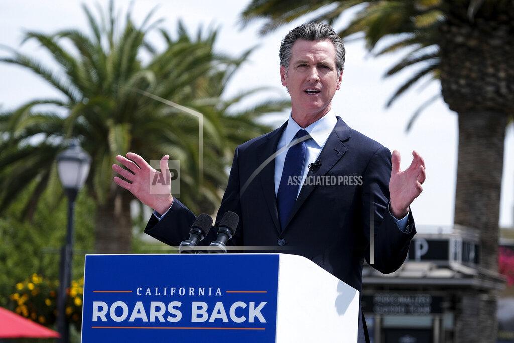Ringo H.w. Chiu California Governor Gavin Newsom talks during a news conference at Universal Studios in Universal City, Calif., on Tuesday, June 15, 2021. Starting Tuesday, there were no more state rules on social distancing, and no more limits on capacity at restaurants, bars, supermarkets, gyms, stadiums or anywhere else. (AP Photo/Ringo H.W. Chiu)
