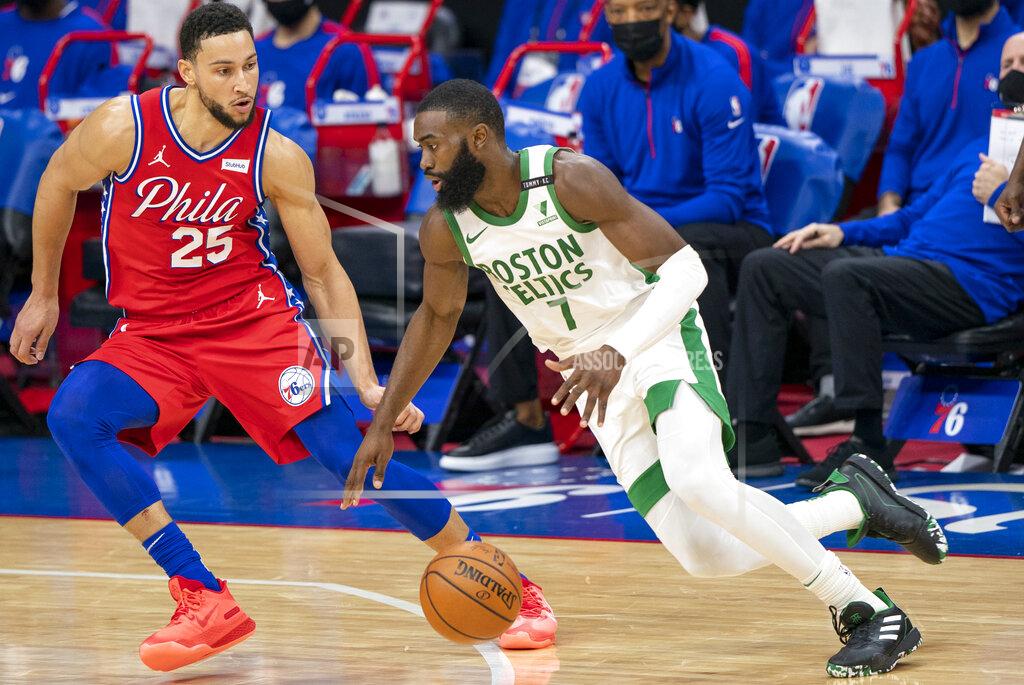 Chris Szagola Boston Celtics' Jaylen Brown, right, drives to the basket against Philadelphia 76ers' Ben Simmons, left, during the first half of an NBA basketball game, Friday, Jan. 22, 2021, in Philadelphia. (AP Photo/Chris Szagola)