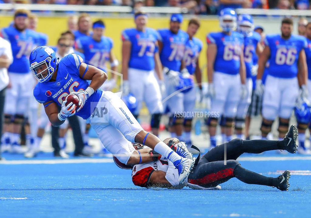 Steve Conner Boise State tight end Chase Blakley, left, is tackled after a reception by a San Diego State defender in the first half of an NCAA college football game, Saturday, Oct. 6, 2018, in Boise, Idaho. (AP Photo/Steve Conner)