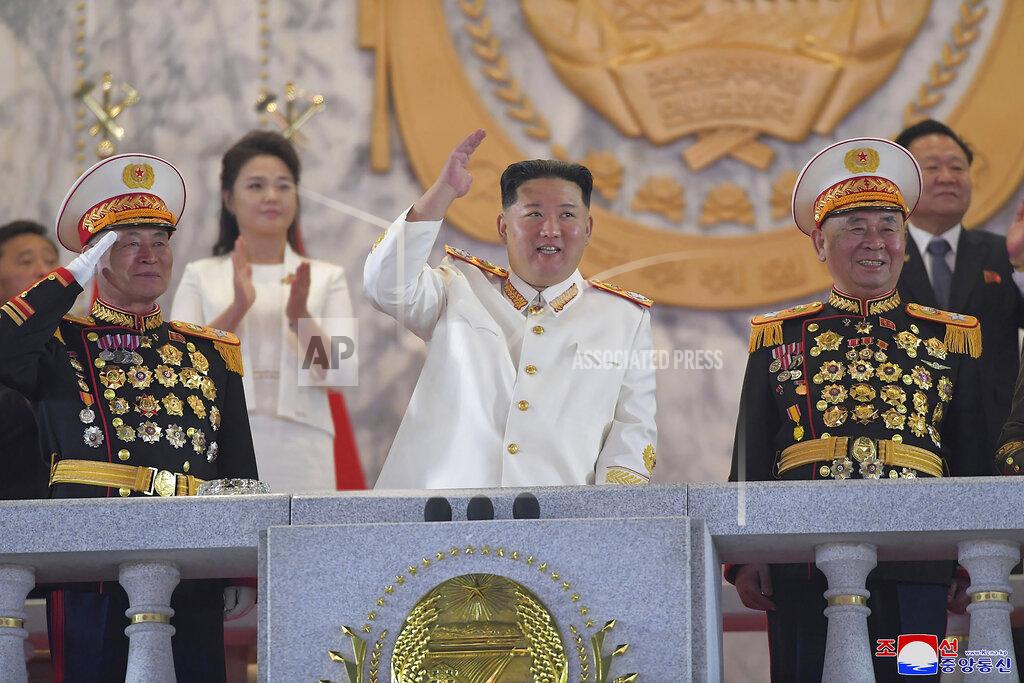 朝鮮通信社 FILE - In this photo provided by the North Korean government, North Korean leader Kim Jong Un, center, watches a military parade to mark the 90th anniversary of North Korea's army at the Kim Il Sung Square in Pyongyang, North Korea, April 25, 2022. When the U.S. and South Korean leaders meet Saturday, May 21, North Korea’s nuclear weapons and missile program, already a major focus, may receive extra attention if intelligence predictions of an imminent major weapons demonstration by the North, which is struggling with a COVID-19 outbreak, are right. Independent journalists were not given access to cover the event depicted in this image distributed by the North Korean government. The content of this image is as provided and cannot be independently verified. Korean language watermark on image as provided by source reads: "KCNA" which is the abbreviation for Korean Central News Agency. (Korean Central News Agency/Korea News Service via AP, File)