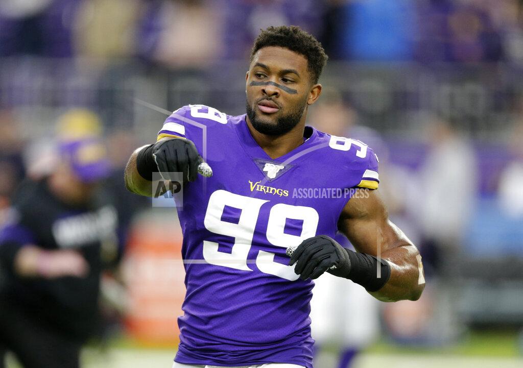 Andy Clayton-King FILE - In this Dec. 29, 2019, file photo, Minnesota Vikings defensive end Danielle Hunter warms up before the team's NFL football game against the Chicago Bears in Minneapolis. Hunter does not appear close to returning to the team. Coach Mike Zimmer said the two-time Pro Bowl pick was in New York for a second medical opinion on his reported neck injury. Hunter was placed on injured reserve Sept. 9. (AP Photo/Andy Clayton-King, File)
