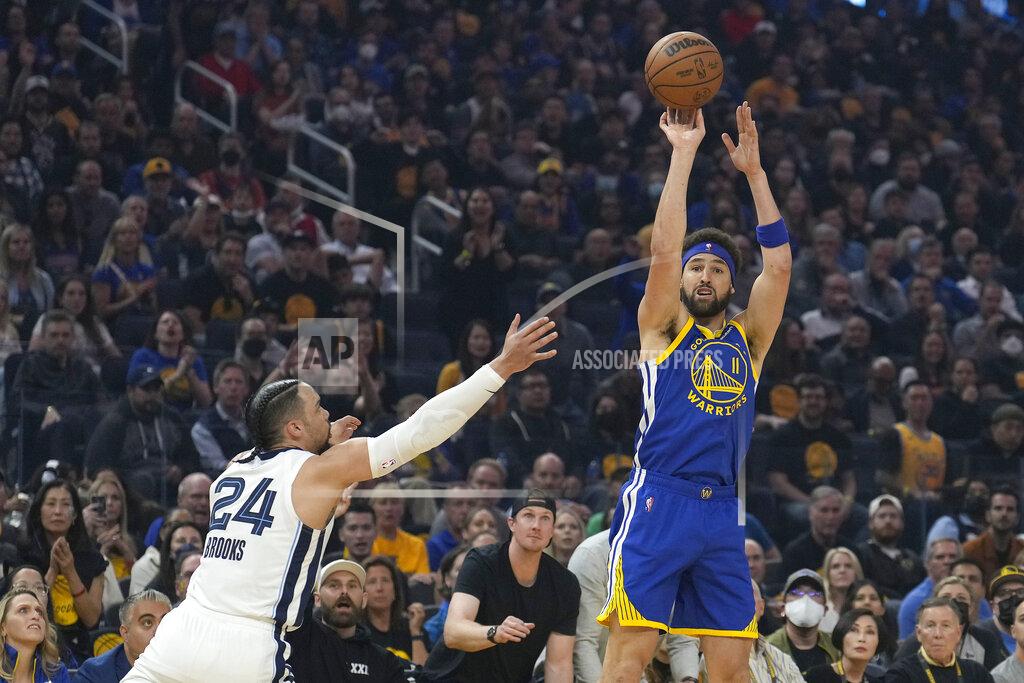 Tony Avelar Golden State Warriors guard Klay Thompson (11) shoots next to Memphis Grizzlies forward Dillon Brooks (24) during the first half of Game 6 of an NBA basketball Western Conference playoff semifinal in San Francisco, Friday, May 13, 2022. (AP Photo/Tony Avelar)