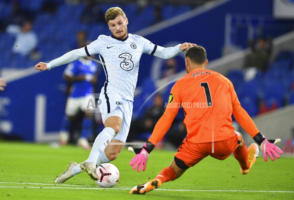 Glynn Kirk Chelsea's Timo Werner, left, is challenged by Brighton's goalkeeper Mathew Ryan during the English Premier League soccer match between Brighton and Chelsea at Falmer Stadium in Brighton, England, Monday, Sept. 14, 2020. (Glynn Kirk/Pool via AP)