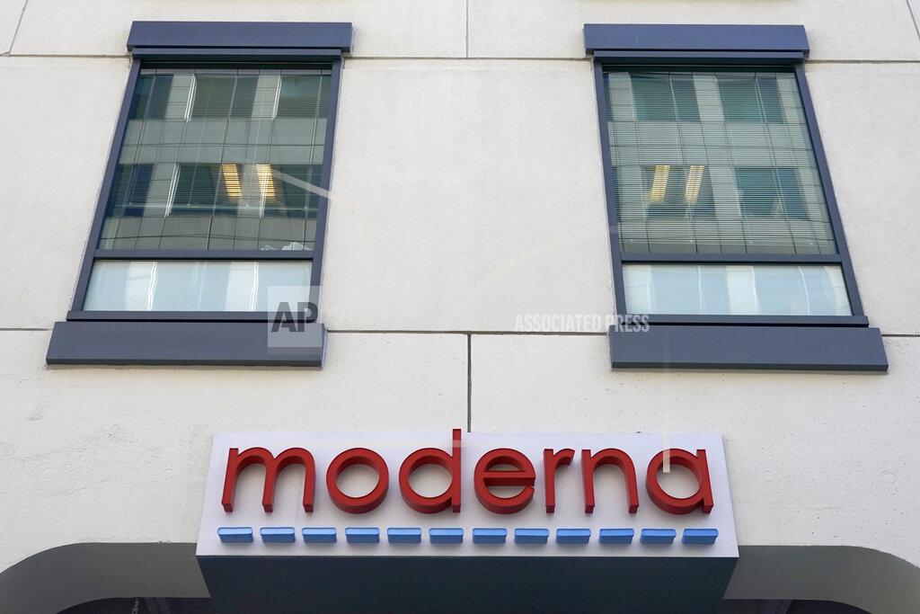 Elise Amendola FILE - In this Dec. 15, 2020, file photo, a sign for Moderna, Inc. hangs on its headquarters in Cambridge, Mass. The U.S. is poised to give the green light as early as Friday, Dec. 18, to a second COVID-19 vaccine, a critical new weapon against the surging coronavirus. Doses of the vaccine developed by Moderna Inc. and the National Institutes of Health will give a much-needed boost to supplies as the biggest vaccination effort in the nation’s history continues. (AP Photo/Elise Amendola, File)