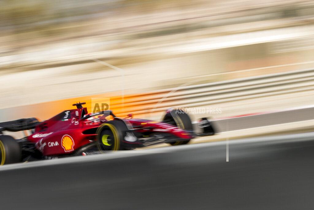 Hassan Ammar Ferrari driver Charles Leclerc of Monaco steers his car during the first free practice at the Formula One Bahrain International Circuit in Sakhir, Bahrain, Friday, March 18, 2022. (AP Photo/Hassan Ammar)