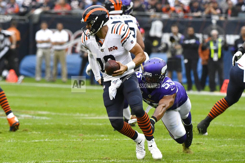 Matt Marton Chicago Bears quarterback Mitchell Trubisky (10) scrambles away from Minnesota Vikings outside linebacker Anthony Barr (55) during the half of an NFL football game Sunday, Sept. 29, 2019, in Chicago. (AP Photo/Matt Marton)