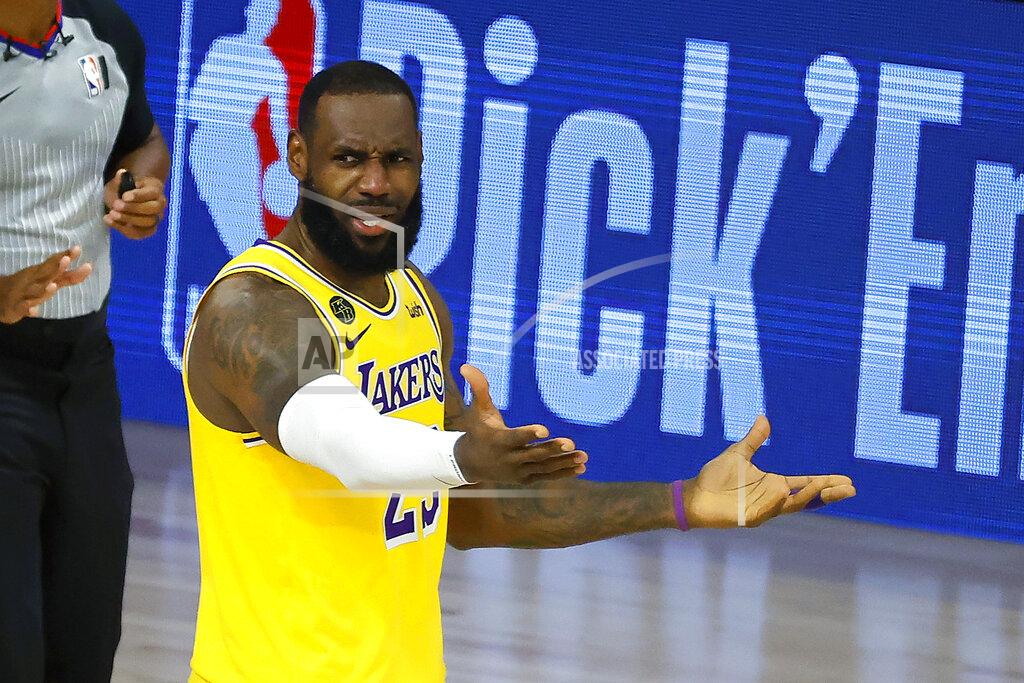 Kevin C. Cox LeBron James of the Los Angeles Lakers reacts to a call against the Oklahoma City Thunder during the second half of an NBA basketball game Wednesday, Aug. 5, 2020, in Lake Buena Vista, Fla. (Kevin C. Cox/Pool Photo via AP)