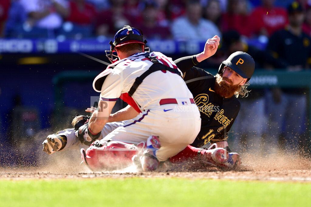 Derik Hamilton Pittsburgh Pirates' Colin Moran, right, is tagged out at home plate by Philadelphia Phillies' J.T. Realmuto (10) on a double hit by Ke'Bryan Hayes during the seventh inning of a baseball game, Sunday, Sept. 26, 2021, in Philadelphia. (AP Photo/Derik Hamilton)