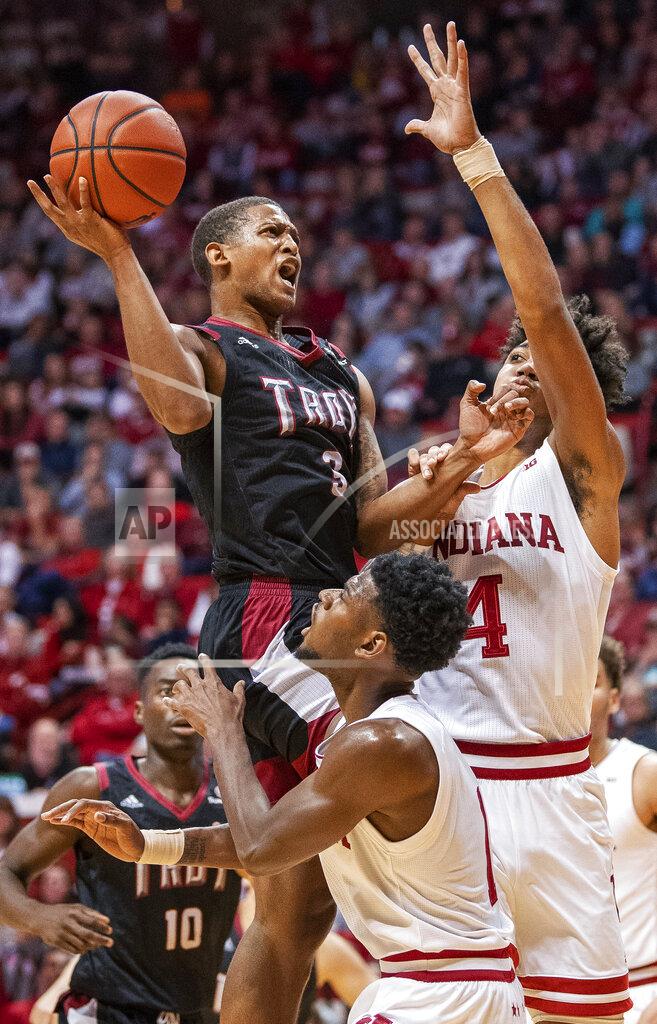 Rich Janzaruk Troy's Darian Adams goes up for the shot between Indiana's Trayce Jackson-Davis (4) and Al Druham (1) during an NCAA college basketball game Saturday, Nov. 16, 2019, in Bloomington, Ind. (Rich Janzaruk/The Herald-Times via AP