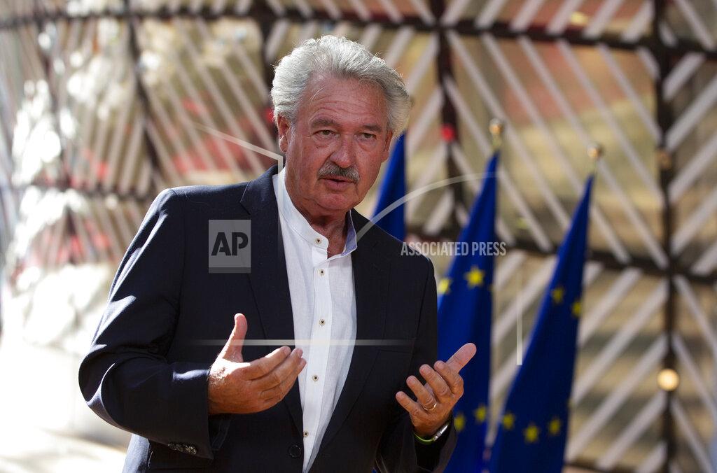Virginia Mayo Luxembourg's Foreign Minister Jean Asselborn makes a statement to the media as he arrives for a meeting of EU foreign ministers at the European Council building in Brussels, Monday, July 13, 2020. European Union foreign ministers meet for the first time face-to-face since the pandemic lockdown and will assess their fraught relations with China and discuss the troubled relation with Turkey. (AP Photo/Virginia Mayo, Pool)