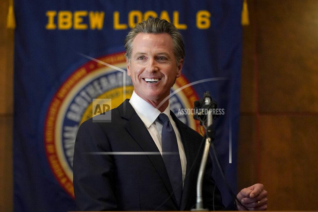 Jeff Chiu Gov. Gavin Newsom speaks to volunteers in San Francisco, Tuesday, Sept. 14, 2021. The recall election that could remove California Democratic Gov. Newsom is coming to an end. Voting concludes Tuesday in the rare, late-summer election that has emerged as a national battlefront on issues from COVID-19 restrictions to climate change. (AP Photo/Jeff Chiu)