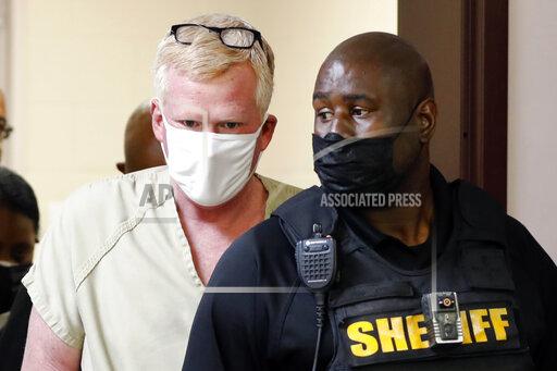 FILE - Alex Murdaugh walks into his bond hearing Thursday, Sept. 16, 2021, in Varnville, S.C. For a century, the Murdaughs have quietly steered much of the legal world in this corner of the state, by running the prosecutor’s office and a large civil law firm. Then, in June, Murdaugh’s wife, Maggie, and son Paul were killed at the family’s sprawling estate. Six investigations are underway, over the killings, stolen money, death coverups and a Sept. 4 shooting in which a bullet grazed Murdaugh’s head on a lonely highway. Police said he tried to arrange his own death and make sure a $10 million life insurance policy would pay off for his surviving son. (AP Photo/Mic Smith)