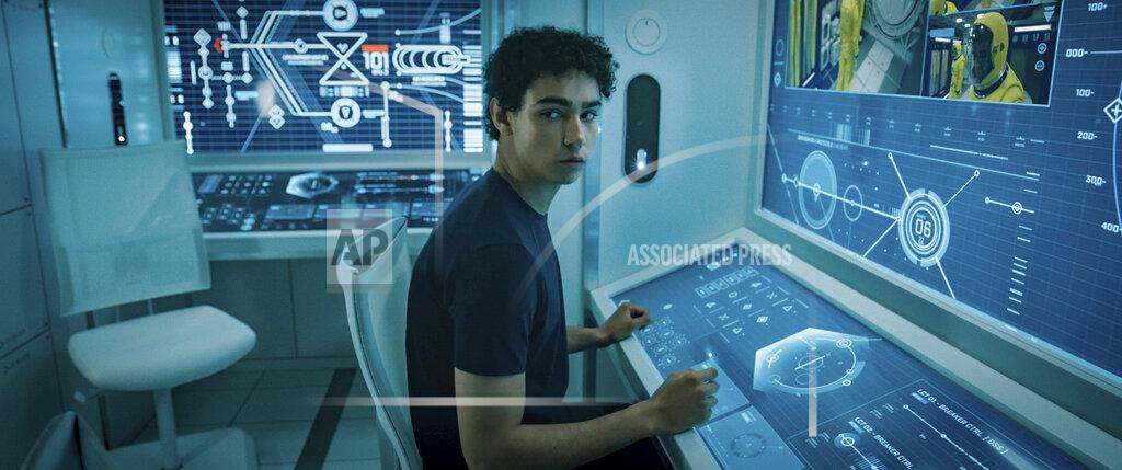 Uncredited This image released by Lionsgate shows Archie Madekwe in a scene from "Voyagers." (Lionsgate via AP)