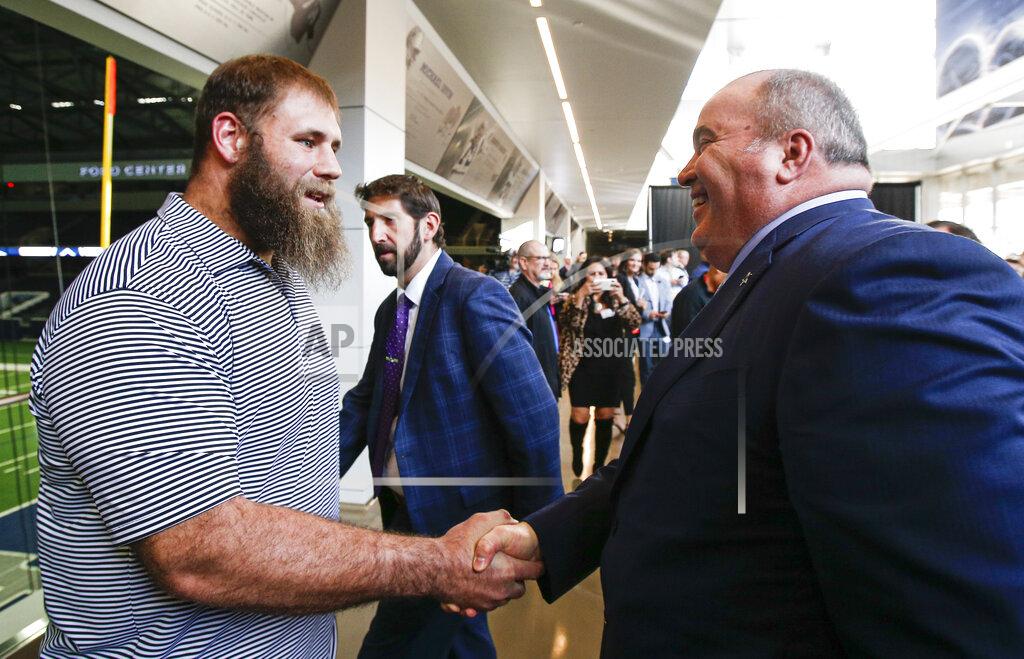 Brandon Wade New Dallas Cowboys head coach Mike McCarthy, right, greets player Travis Frederick after a press conference at the Dallas Cowboys headquarters Wednesday, Jan. 8, 2020, in Frisco, Texas. (AP Photo/Brandon Wade)