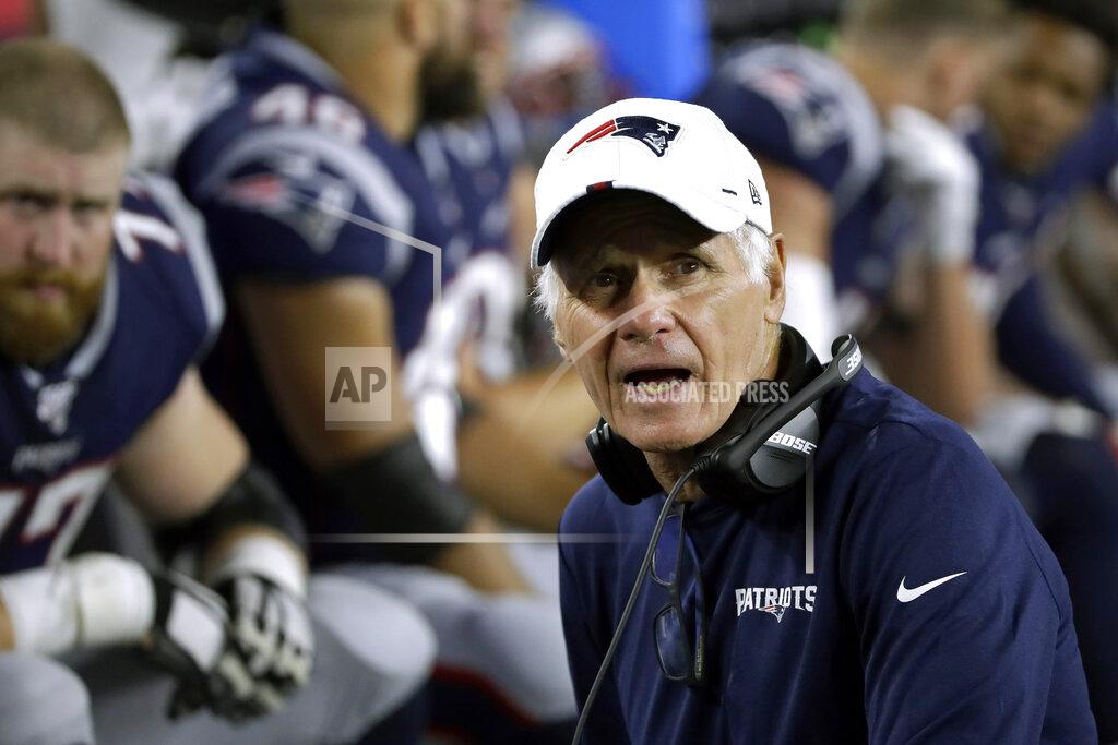 Elise Amendola FILE- In this Aug. 29, 2019, file photo, New England Patriots offensive line coach Dante Scarnecchia gives instructions on the sideline during the second half of an NFL preseason football game against the New York Giants in Foxborough, Mass. Tom Brady's future remains priority No. 1 for the Patriots this offseason. But coach Bill Belichick suddenly also has several key positions to fill on his coaching staff. A major hole was created this week when Scarnecchia announced his retirement after 36 seasons in the NFL. (AP Photo/Elise Amendola, File)