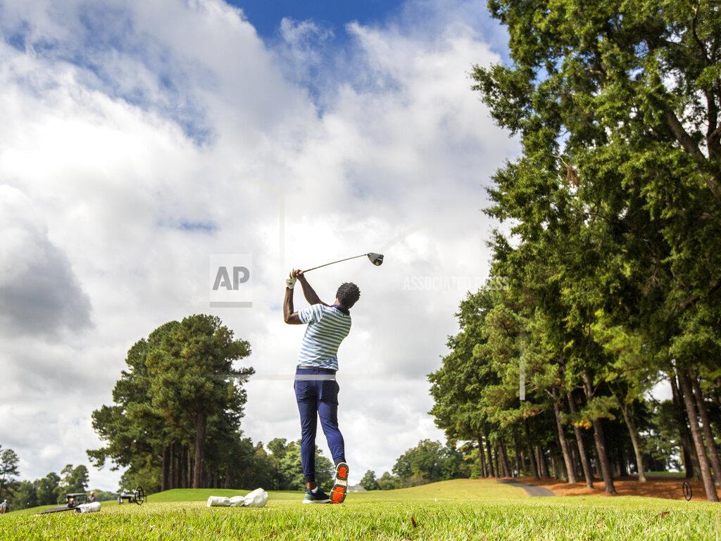 Woody Marshall North Carolina A&T's J.R. Smith drives from the sixth tee during the second round of the Phoenix Invitational golf tournament in Burlington, N.C., Tuesday, Oct. 12, 2021. Smith spent 16 years playing in the NBA, winning two world championships. (Woody Marshall/News & Record via AP)