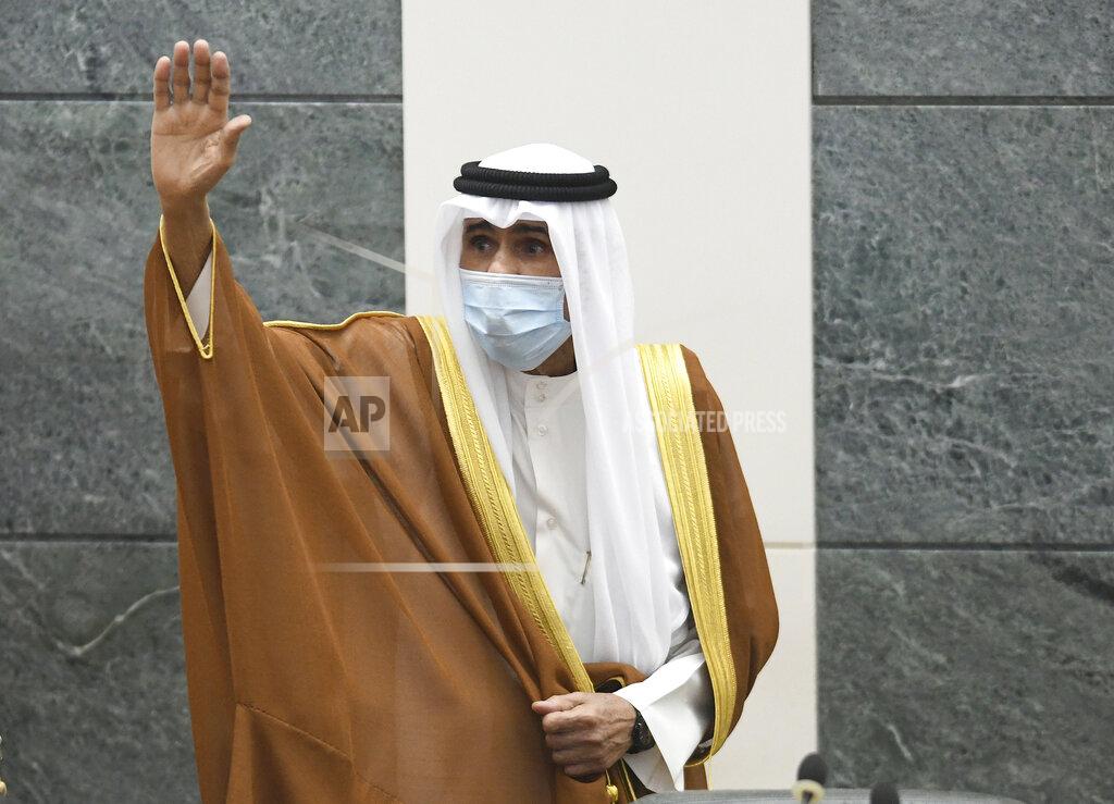Jaber Abdulkhaleg FILE - In this Sept. 30, 2020 file photo, the new Emir of Kuwait Sheikh Nawaf Al Ahmad Al Sabah, waves after he was sworn in at the Kuwaiti National Assembly in Kuwait. The state news agency said Wednesday, Oct. 7, 2020, that the deputy chief of the National Guard, who spent years in the oil-rich country’s security services, was nominated as crown prince. The nomination makes Sheikh Meshal Al Ahmed Al Jaber Al Sabah the heir apparent to the 83-year-old new emir. But lawmakers must approve the chosen successor during its final session on Thursday, ahead of the formation of a new government. (AP Photo/Jaber Abdulkhaleg, File)