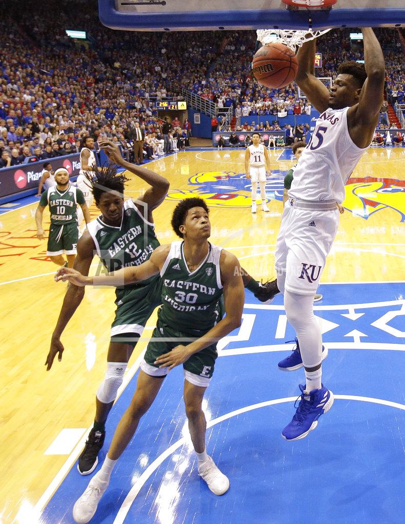 Charlie Riedel Kansas' Udoka Azubuike (35) gets past Eastern Michigan's Jalen King (30) to dunk the ball during the first half of an NCAA college basketball game Saturday, Dec. 29, 2018, in Lawrence, Kan. (AP Photo/Charlie Riedel)