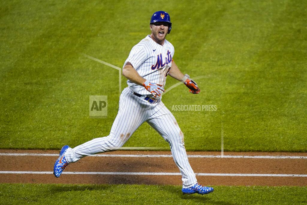 Kathy Willens New York Mets' Pete Alonso reacts toward the dugout after hitting a walkoff two-run home run during the 10th inning of a makeup baseball game against the New York Yankees at Citi Field, Thursday, Sept. 3, 2020, in New York. (AP Photo/Kathy Willens)