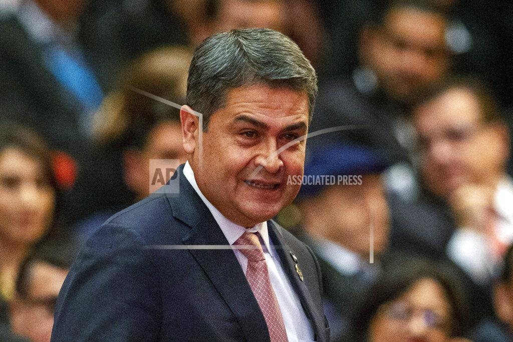 Moises Castillo FILE - In this Jan. 14, 2020, file photo, Honduras' President Juan Orlando Hernandez arrives for the swearing-in ceremony for Guatemala's new President Alejandro Giammattei at the National Theater in Guatemala City. The Honduras president announced in June that he had tested positive, along with two other people who worked closely with him. (AP Photo/Moises Castillo, File)
