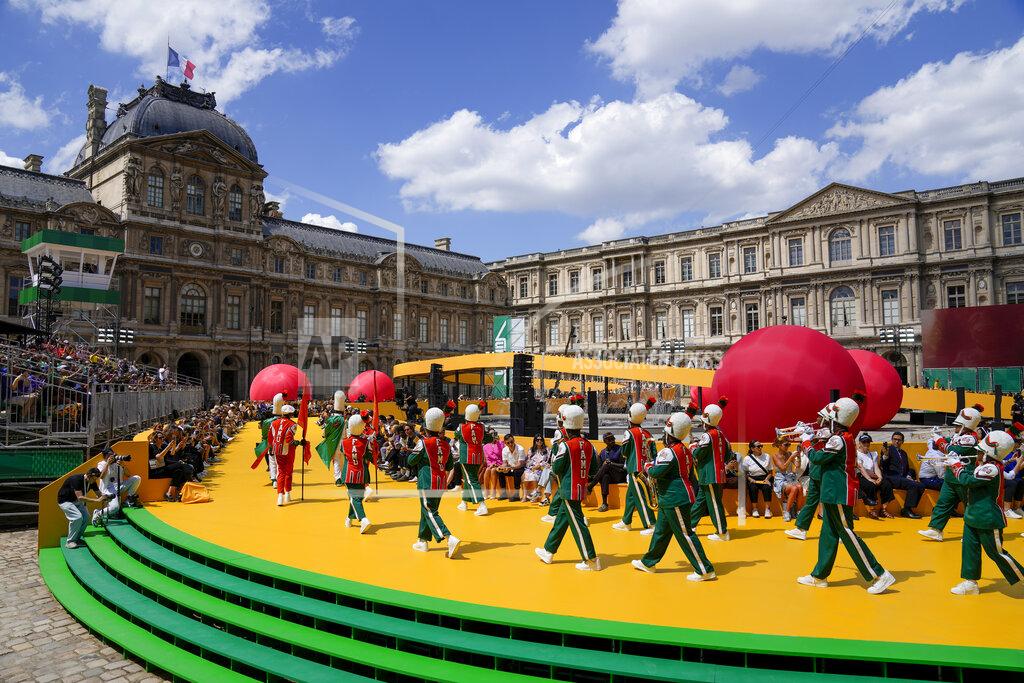 Francois Mori CORRECTS DATE A marching band performs as part of the Louis Vuitton men's Spring Summer 2023 collection presented in Paris, France, Thursday, June 23, 2022. (AP Photo/Francois Mori)