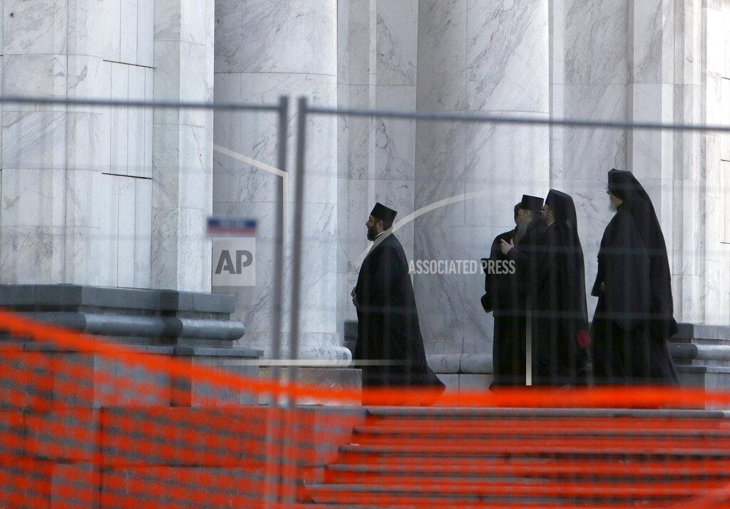 Darko Vojinovic Serbian Orthodox Church bishops arrive in the St. Sava temple before church closed session in Belgrade, Serbia, Thursday, Feb. 18, 2021. The Serbian Orthodox Church gathers in closed session to pick a new Patriarch, following the death of old one Irinej. Irinej died last year of COVID, following the outbreak of virus among church officials in Belgrade. (AP Photo/Darko Vojinovic)