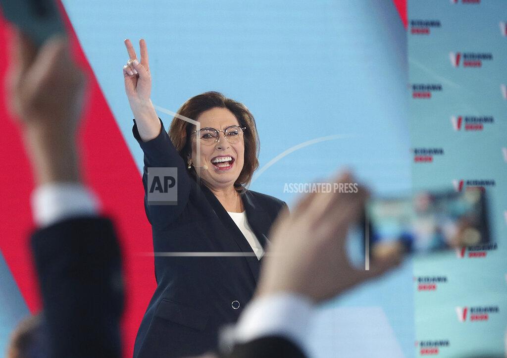 Czarek Sokolowski FILE - In this file photo taken Feb. 29, 2020, liberal opposition Civic Platform party candidate for president Malgorzata Kidawa-Blonska, campaigning in Warsaw, Poland. The Polish government’s determination to move forward with the May 10, presidential election during the coronavirus pandemic by making it an all-postal vote is creating anxiety and anger, and critics say the plan threatens public health and democracy in Poland.(AP Photo/Czarek Sokolowski)