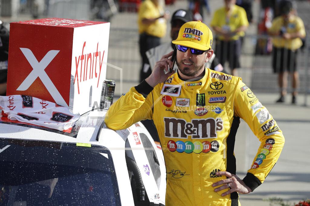 Darron Cummings NASCAR Xfinity Series driver Kyle Busch makes a phone call after winning the NASCAR Xfinity auto race at the Indianapolis Motor Speedway, Saturday, Sept. 7, 2019 in Indianapolis. (AP Photo/Darron Cummings)