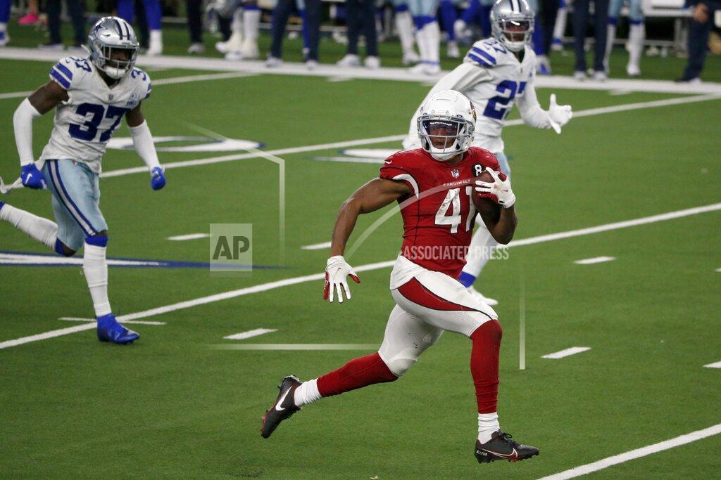 Michael Ainsworth Arizona Cardinals running back Kenyan Drake (41) sprints to the end zone for a touchdown as Dallas Cowboys' Donovan Wilson (37) and Trevon Diggs (27) give chase in the second half of an NFL football game in Arlington, Texas, Monday, Oct. 19, 2020. (AP Photo/Michael Ainsworth)