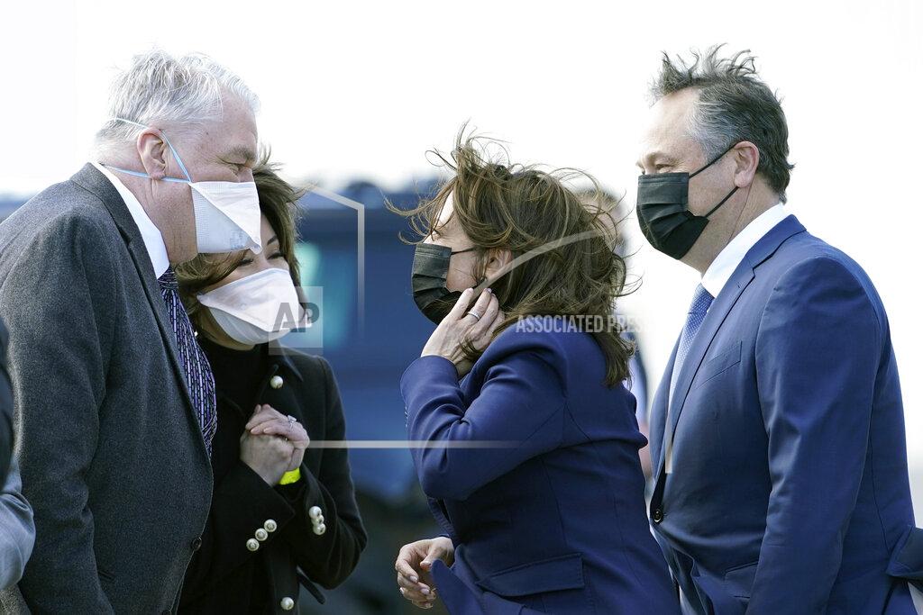 Jacquelyn Martin Vice President Kamala Harris and her husband, Doug Emhoff, are greeted by Nevada Gov. Steve Sisolak and his wife Kathy, as they arrive in Las Vegas, Monday, March 15, 2021. President Joe Biden, Vice President Kamala Harris and their spouses are opening an ambitious, cross-country tour to highlight the $1.9 trillion coronavirus relief plan and its benefits. (AP Photo/Jacquelyn Martin)