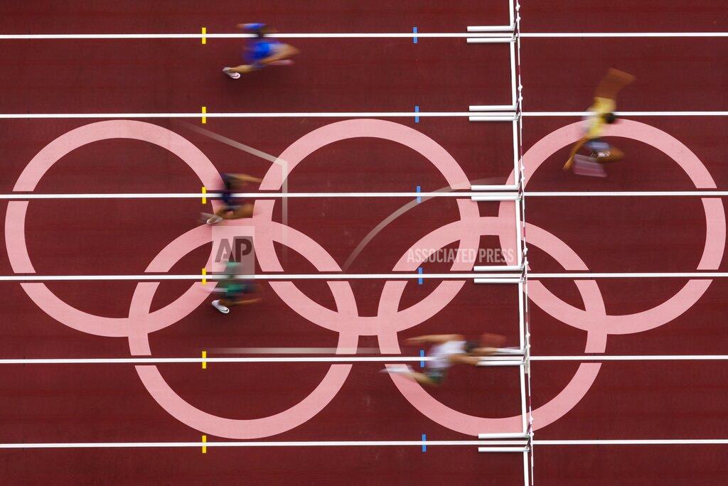 Morry Gash Runners competes during the first round of the men's 400-meter hurdles at the 2020 Summer Olympics, Friday, July 30, 2021, in Tokyo. (AP Photo/Morry Gash)