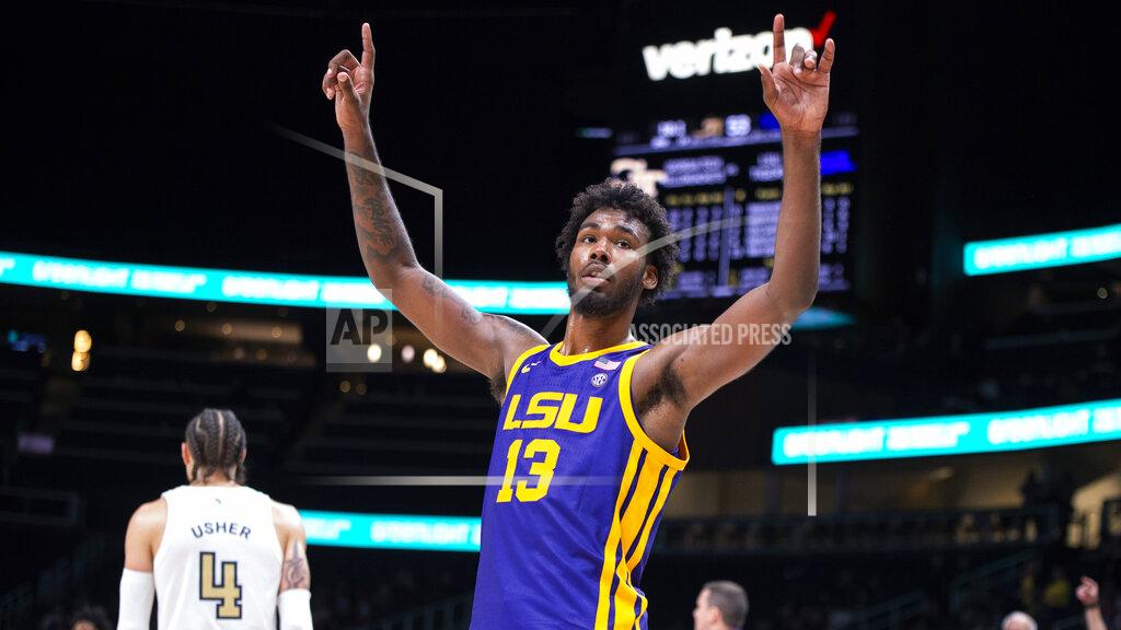 Hakim Wright Sr. LSU forward Tari Eason (13) celebrates during the second half of the team's NCAA college basketball game against Georgia Tech on Saturday, Dec. 11, 2021, in Atlanta. (AP Photo/Hakim Wright Sr.)