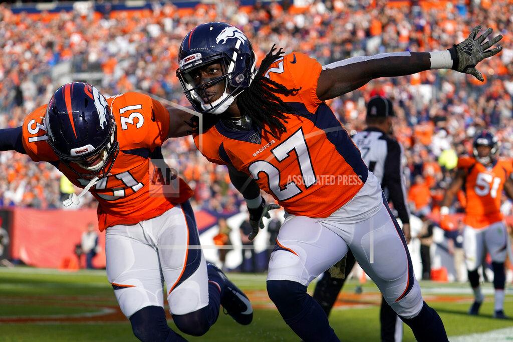 Jack Dempsey Denver Broncos cornerback Davontae Harris (27) celebrates with free safety Justin Simmons (31) after breaking up a pass in the end zone during the first half of NFL football game against the Cleveland Browns, Sunday, Nov. 3, 2019, in Denver. (AP Photo/Jack Dempsey)