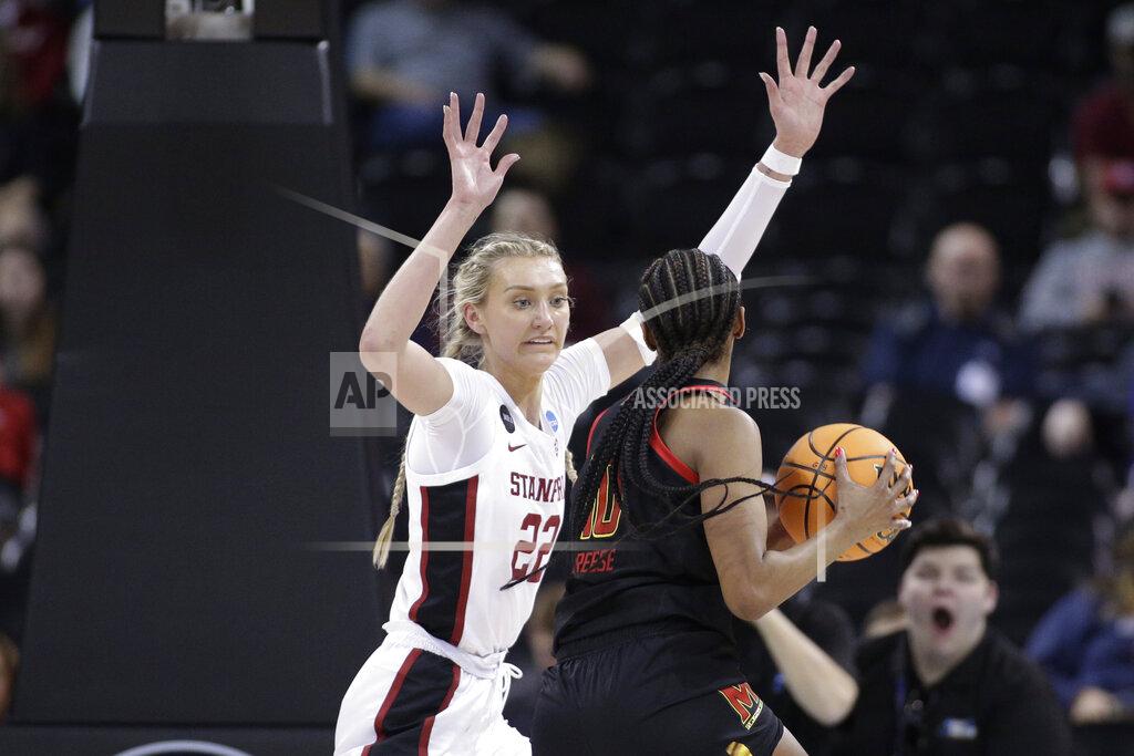 Young Kwak Stanford Cameron Brink (22) defends as Maryland forward Angel Reese (10) drives to the basket during the first half of a college basketball game in the Sweet 16 round of the NCAA tournament, Friday, March 25, 2022, in Spokane, Wash. (AP Photo/Young Kwak)