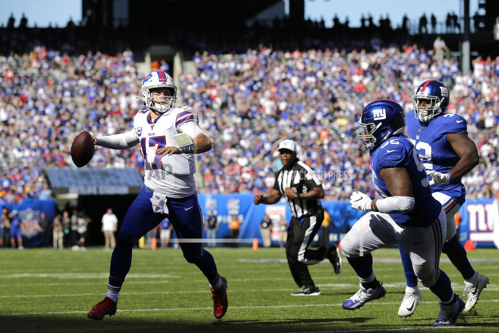 Adam Hunger Buffalo Bills quarterback Josh Allen, left, looks to throw during the second half of an NFL football game against the New York Giants, Sunday, Sept. 15, 2019, in East Rutherford, N.J. The Bills defeated the Giants 28-14. (AP Photo/Adam Hunger)