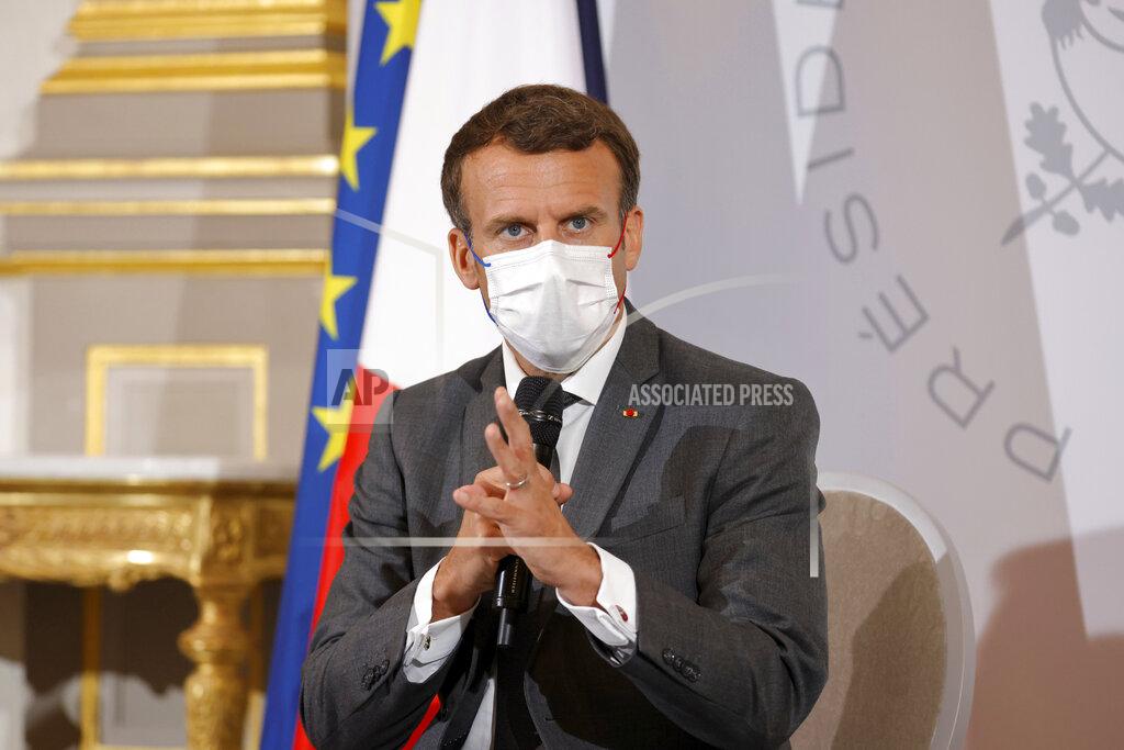 Pascal Rossignol FILE - In this June 9, 2021, file photo, French President Emmanuel Macron attends a meeting with NGO representatives ahead of the G7 Summit, at the Elysee Palace in Paris. Helping countries recover from the coronavirus pandemic will be at the top of the agenda for the Group of Seven summit when British Prime Minister Boris Johnson welcomes President Joe Biden and the leaders of France, Germany, Italy, Japan and Canada to the cliff-ringed Carbis Bay beach resort in southwestern England on Friday, June 11. (Pascal Rossignol/Pool via AP, File)
