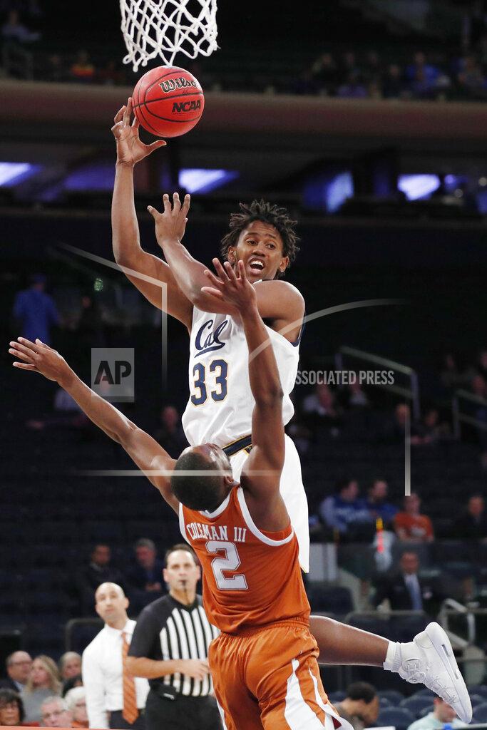 Kathy Willens California forward D.J. Thorpe (33) passes as he collides with Texas guard Matt Coleman III (2) beneath the basket during the first half of an NCAA college basketball game in the 2K Empire Classic, Friday, Nov. 22, 2019, in New York. (AP Photo/Kathy Willens)