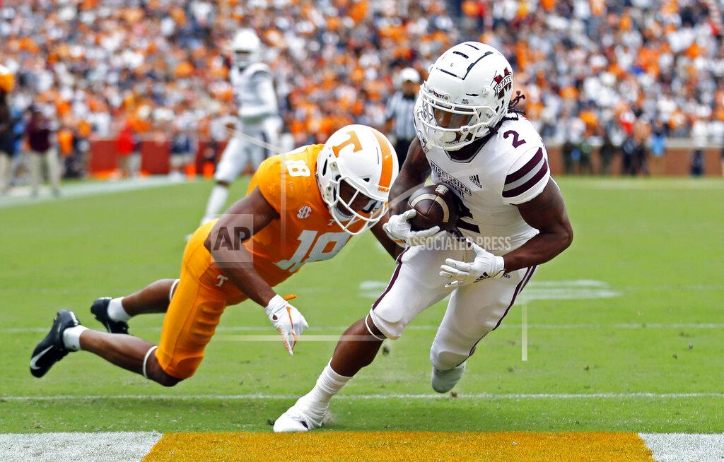 Wade Payne Mississippi State wide receiver Deddrick Thomas (2) scores a touchdown as he's defended by Tennessee's Nigel Warrior (18) in the second half of an NCAA college football game Saturday, Oct. 12, 2019, in Knoxville, Tenn. (AP Photo/Wade Payne)