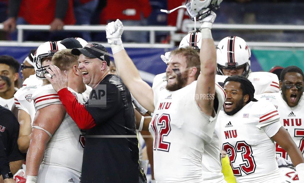 Carlos Osorio Northern Illinois head coach Rod Carey celebrates during the closing seconds of the Mid-American Conference championship NCAA college football game against Buffalo, Friday, Nov. 30, 2018, in Detroit. (AP Photo/Carlos Osorio)