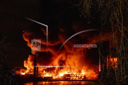 Smoke and flames fill the air from a large chemical fire in Passaic, N.J. on Friday Jan. 14, 2022. Authorities say the fire Friday night and Saturday morning at Majestic Industries and the Qualco chemical plant in Passaic spread to multiple buildings and threatened their collapse. (Anne-Marie Caruso /The Record via AP)