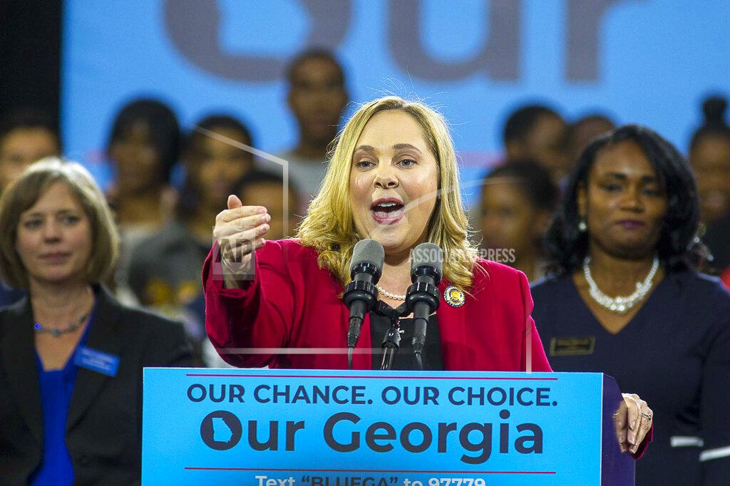 Alyssa Pointer FILE - In a Friday, Nov. 2, 2018 file photo, Sarah Riggs Amico speaks during a rally for Democratic gubernatorial candidate Stacey Abrams in Atlanta. Top Democrats in Georgia's Senate primary include former congressional candidate Jon Ossoff; former Columbus Mayor Teresa Tomlinson; and Amico. (Alyssa Pointer/Atlanta Journal-Constitution via AP, File)